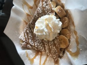 crepes with bananas and whipped cream